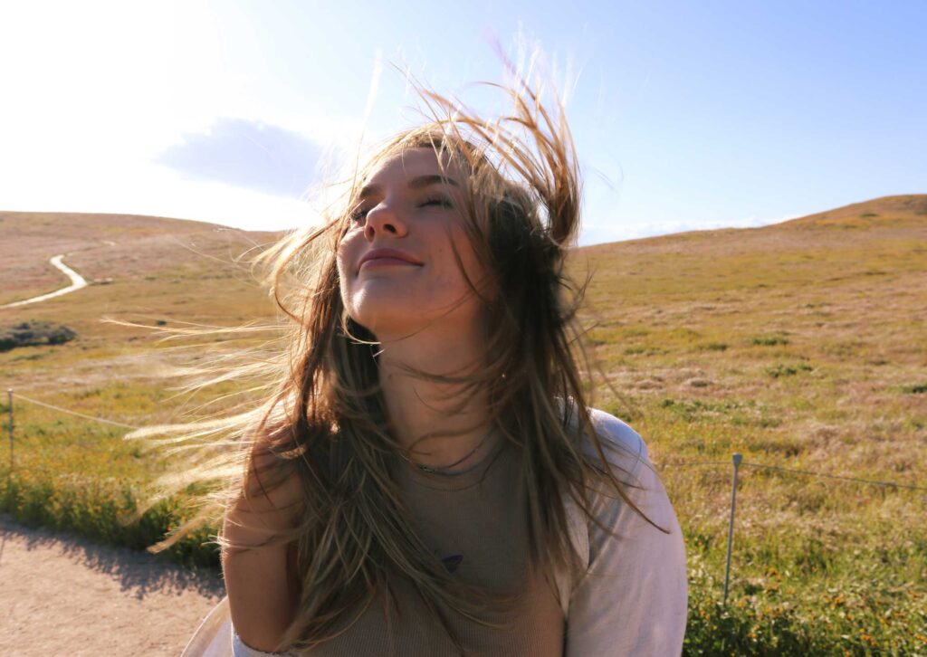 Abbi Berry with wind blowing her hair