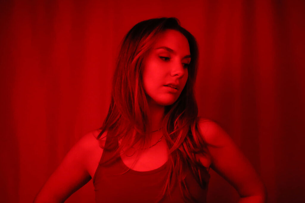 Abbi Berry with red camera filter