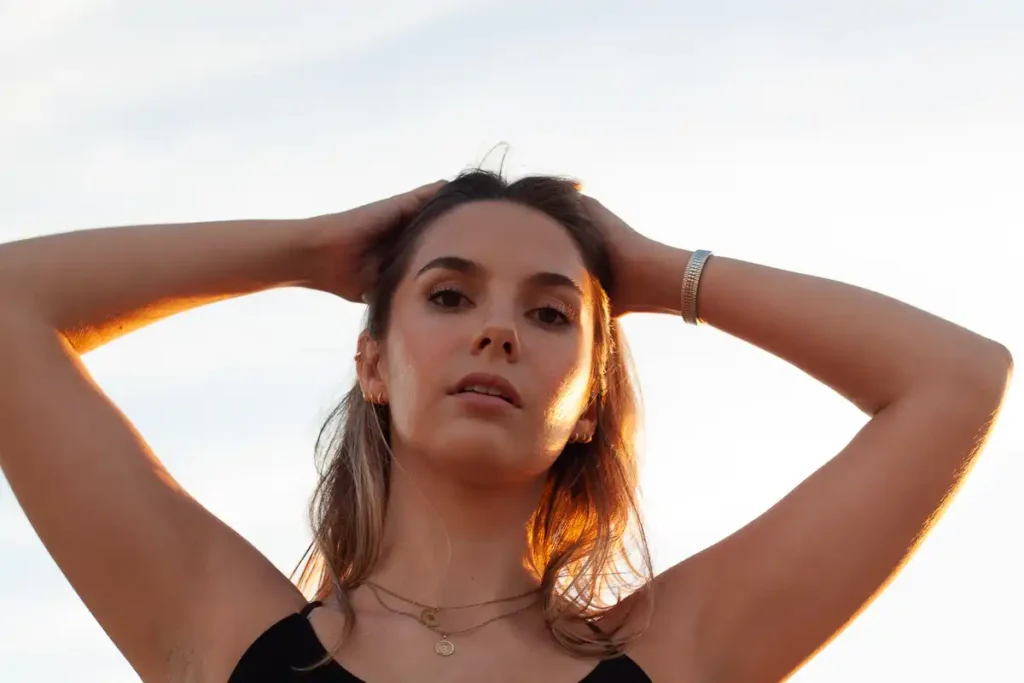 Abbi Berry with hands in hair