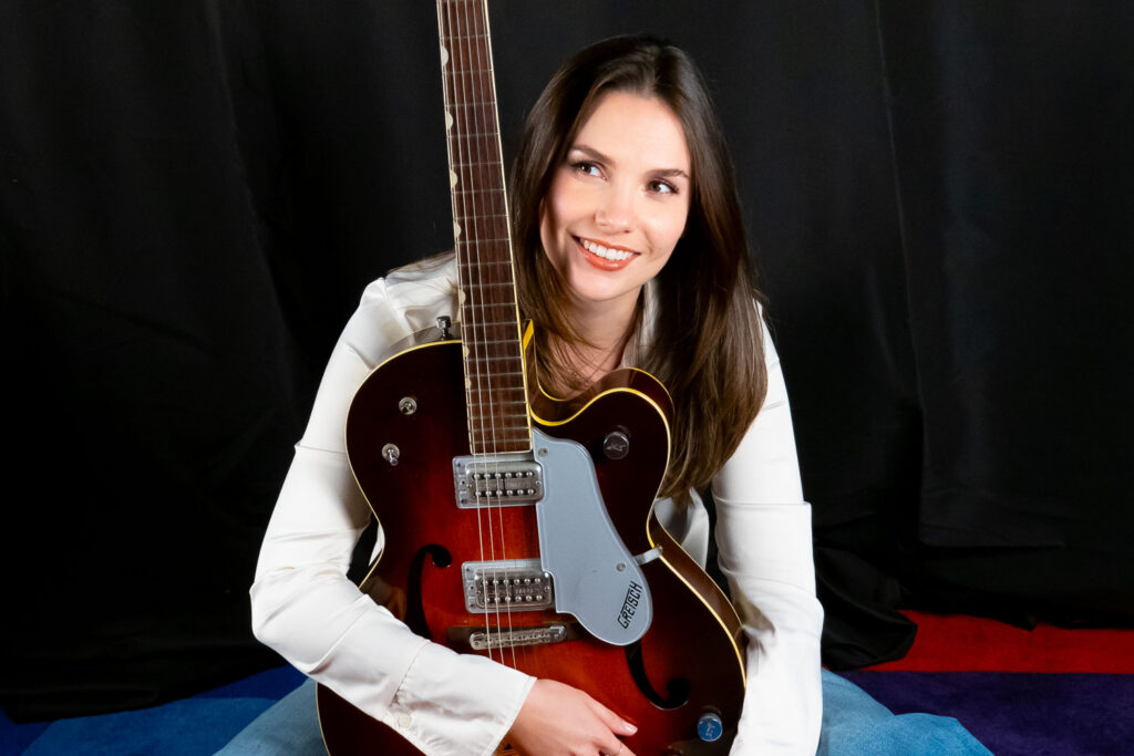 Abbi Berry with guitar